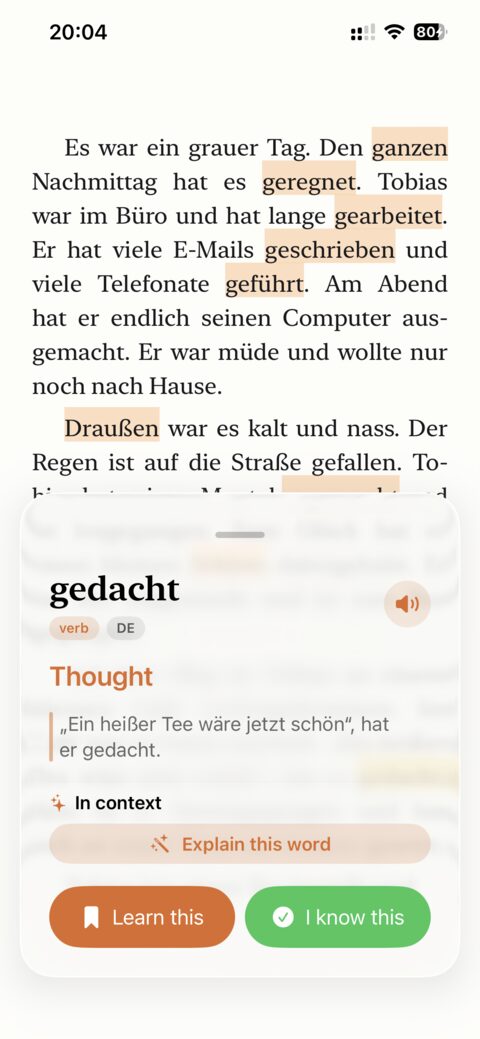 The oqou reader showing a tapped word and its meaning in context